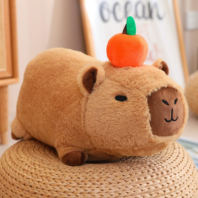 Lying Capybara Loaf Plush With Orange