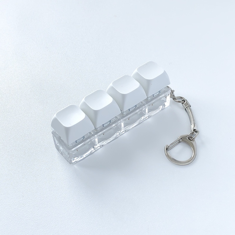 Four-Key Pastel Keyboard Clicker Keychain โ photo 2
