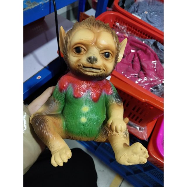 Creepy-Cute Green Christmas Baby Figure โ photo 2