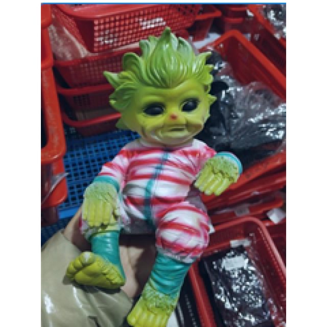 Creepy-Cute Green Christmas Baby Figure โ photo 4