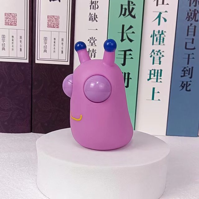 Bug-Eyed Green Grub Squeeze Toy โ photo 2