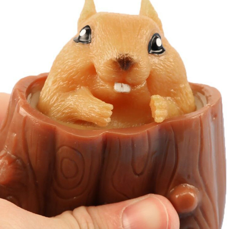 Squeeze-Up Squirrel in a Tree Stump Toy