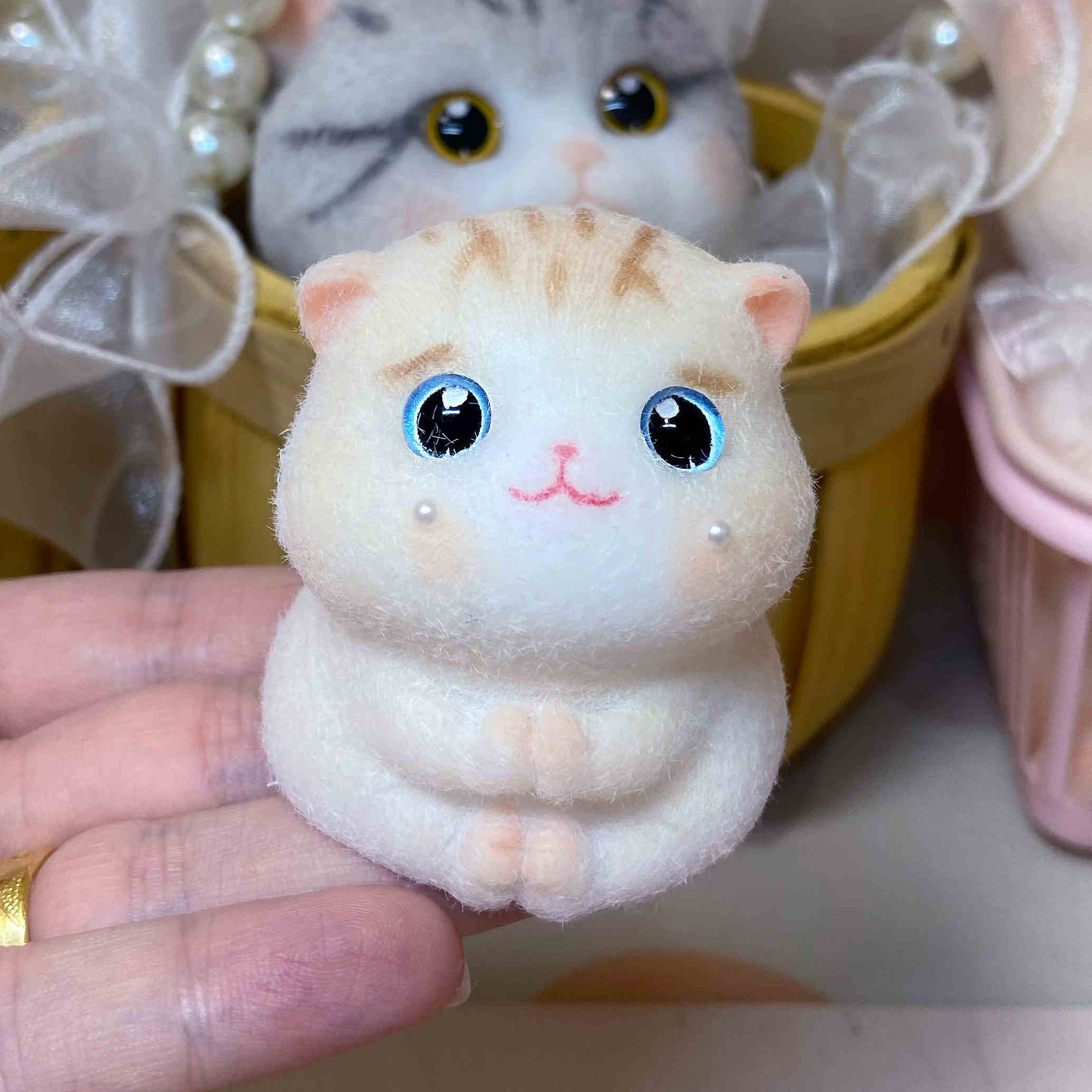 Teary-Eyed Fuzzy Kitten Squishy — photo 2
