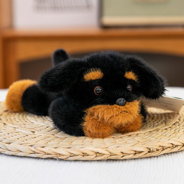 Sleepy Lying Rottweiler Puppy Plush