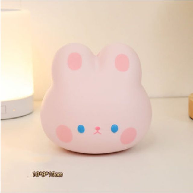 Pink Bunny Head Squishy With Blue Eyes