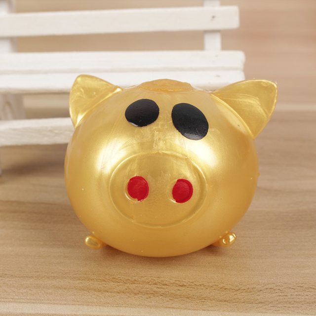 Golden Splat Pig Squeeze Ball